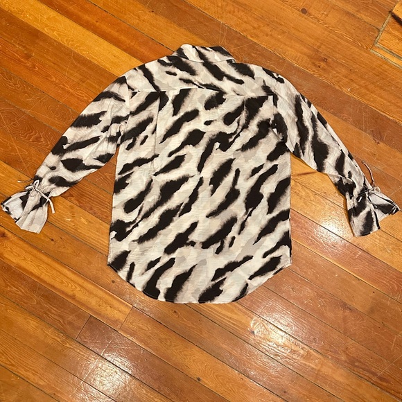 Black and cream zebra print button up blouse with tie at wrist and ruffle cuff - Picture 7 of 7